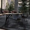 Ted Nero dining table showcasing an elegant and modern design with a dark wood finish, ideal for sophisticated interiors.