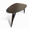 Close-up of the Ted Nero dining table, highlighting its fine details and craftsmanship, showcasing the elegant surface.