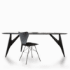Angled view of the Ted Nero dining table, emphasizing its sleek design and modern aesthetics with clean lines.