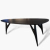 Side view of the Ted Nero dining table, displaying its sturdy structure and refined design.