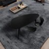 Elegant top view of the Ted Nero dining table with black finish, showcasing sleek and modern design.s